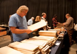 Carl Barney (far right) selling beautiful tonewoods. Photo © Jay Rosenblatt.