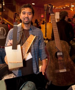 Machihiro Mastuda on two of his concept instruments. Photo © Jay Rosenblatt.