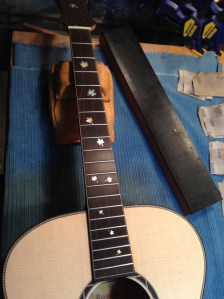 Maple leaf fingerboard top detail