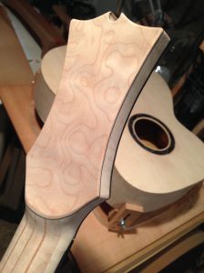 Neck carved and headstock shaped.