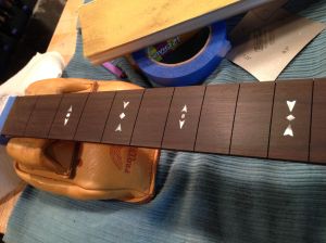 Fingerboard gets inlay