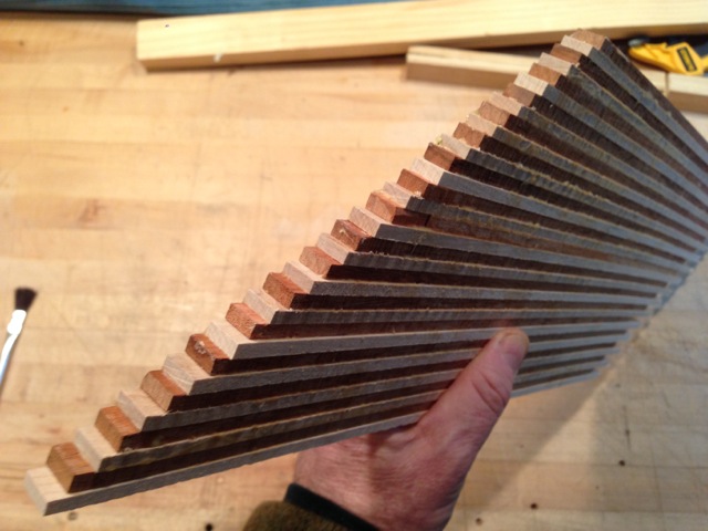 In preparation for the binding, traditional rope binding is made by laminating strips of maple and mahogany together. These will be slices diagonally into thin strips which will be installed as binding around the instrument.