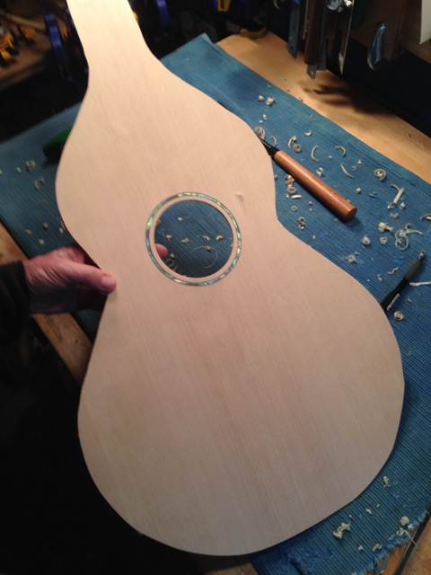 Abalone rosette installed and sound hole cut out