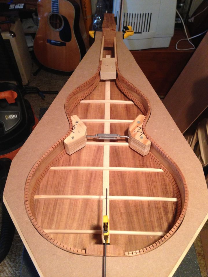 Notches for the back braces are cut and the back is checked for fit